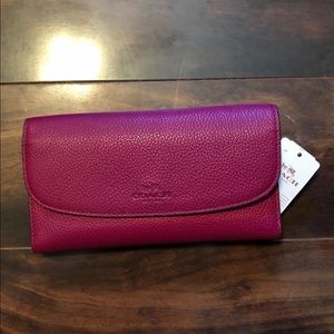 Plum coach wallet